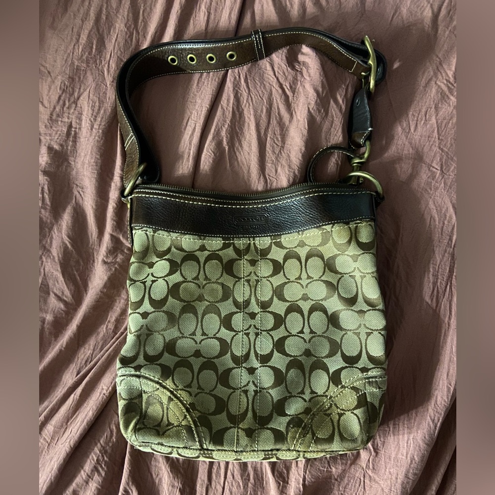 Brown and black coach purse.